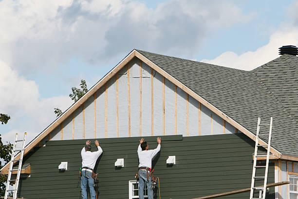 Professional Siding technician working in Fair Haven, NY